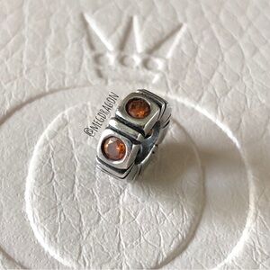 RETIRED Pandora Orange Trinity Spacer